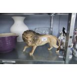 A BESWICK LION AND A SCOTTISH CUT GLASS BOWL