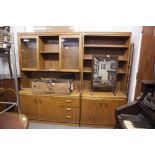 A SUTCLIFFE OF TODMORDEN TEAK 'S FORM' WALL UNIT, WITH DISPLAY SHELVING, THE BASE OF DRAWERS AND