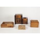 SEVEN VARIOUS WOODEN CIGARETTE BOXES two having simple marquetry inlay, and one with flip up