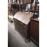 A LARGE LATE EIGHTEENTH CENTURY MAHOGANY BUREAU WITH FITTED INTERIOR OVER TWO SHORT AND THREE LONG