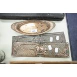A PAIR OF EMBOSSED COPPER DOOR FINGER PLATES AND A COPPER PIERCED OVAL SNUFFERS TRAY (3)