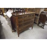 A MAHOGANY INLAID CHEST OF TWO SHORT OVER THREE LONG DRAWERS