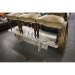 A MODERN VARIEGATED PINK BLUSH MARBLE OBLONG COFFEE TABLE WITH PANELLED SUPPORTS/UNDERFRAME