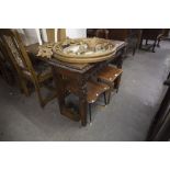 A CIRCA 1900 CARVED OAK SIDE TABLE