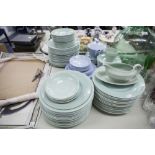 A LARGE QUANTITY OF WOODS WARE 'BERYL' PLAIN GREEN POTTERY DINNER WARES