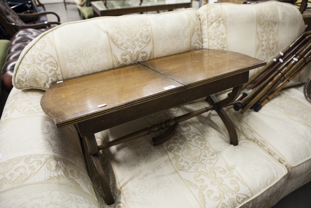 A MAHOGANY REGENCY STYLE OBLONG COFFEE TABLE, ON REEDED 'X' SHAPED SUPPORTS (LEGS A.F.)