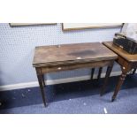 AN ANTIQUE MAHOGANY FOLD OVER TEA TABLE, ON SQUARE TAPERING SUPPORTS