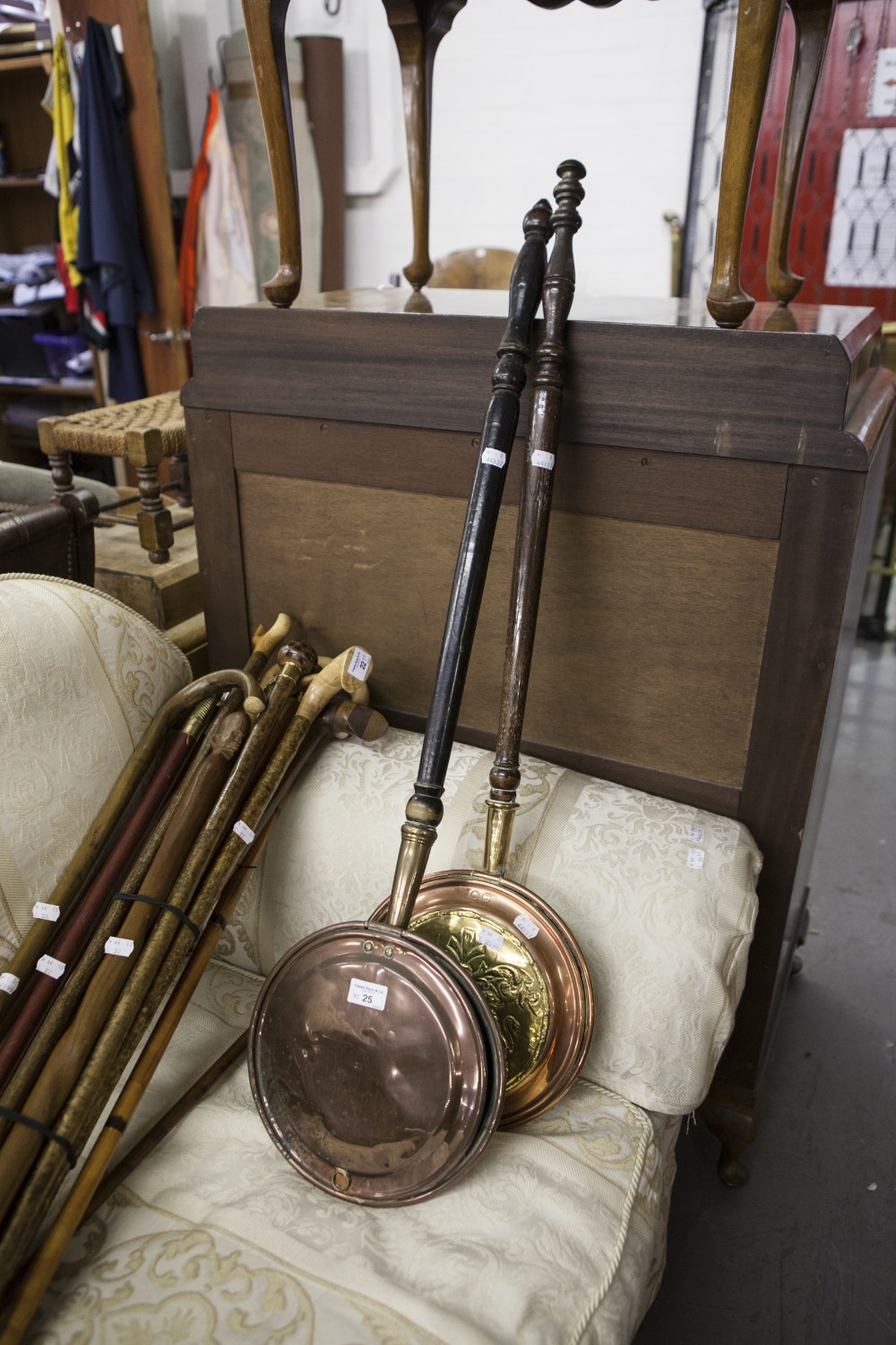 NINETEENTH CENTURY COPPER AND BRASS BED WARMING PAN, WITH UNUSUAL ARMORIAL DECORATION TO THE LID AND