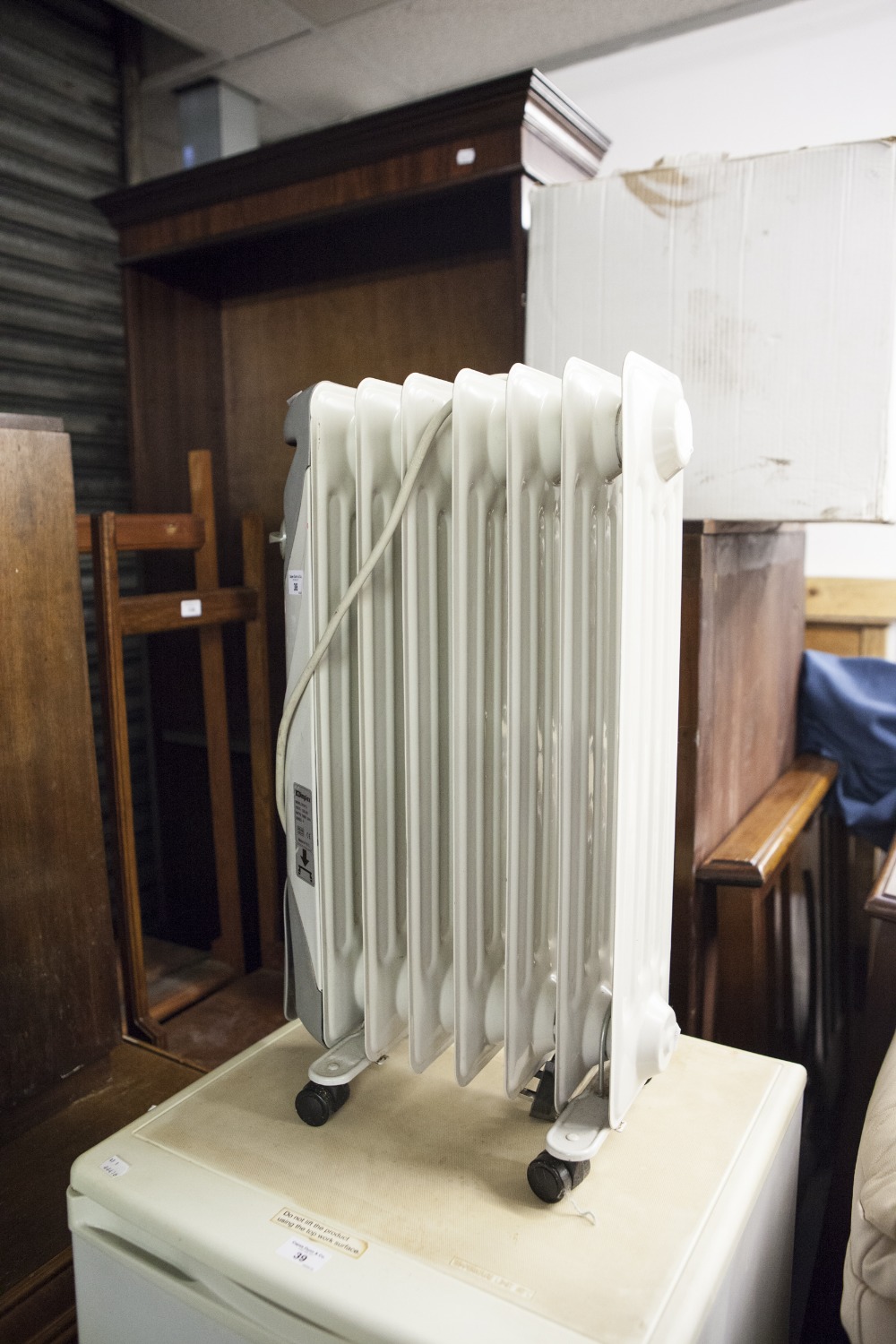 A DIMPLEX ELECTRIC COLUMN OIL FILLED RADIATOR