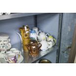 CERAMICS- EIGHT POTTERY COFFEE AND TEAPOTS, including an EARLY CARLTON WARE LARGE COFFEE POT, floral