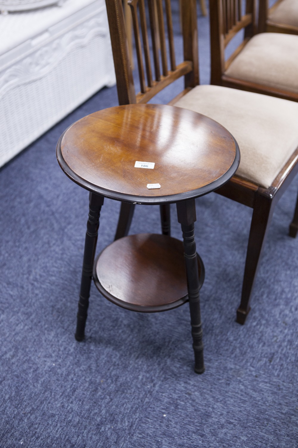 A MAHOGANY CIRCULAR TWO TIER OCCASIONAL TABLE