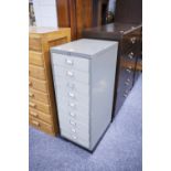 A GREY METAL NEST OF NINE FILING DRAWERS, 14" WIDE, 3'1" HIGH