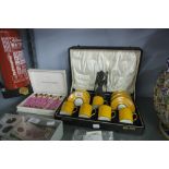 BOXED SET OF ALLERTONS CHINA DEMI TASSE COFFEE CUPS, BOXED SPOONS AND A FAR EASTERN FIGURE