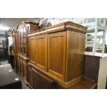 A MODERN MAHOGANY CHIFFONIERE, WITH TWO PIANO FRONTED FRIEZE DRAWERS OVER THREE DOORS, 4'6" WIDE