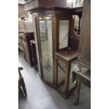 AN EARLY TWENTIETH CENTURY BREAKFRONT DISPLAY CABINET (PREVIOUS DISPLAY STAND) WITH CHEQUER BOARD