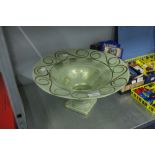 A LARGE HAND PAINTED GLASS FRUIT BOWL, GREEN GROUND WITH GILT SCROLL DECORATION