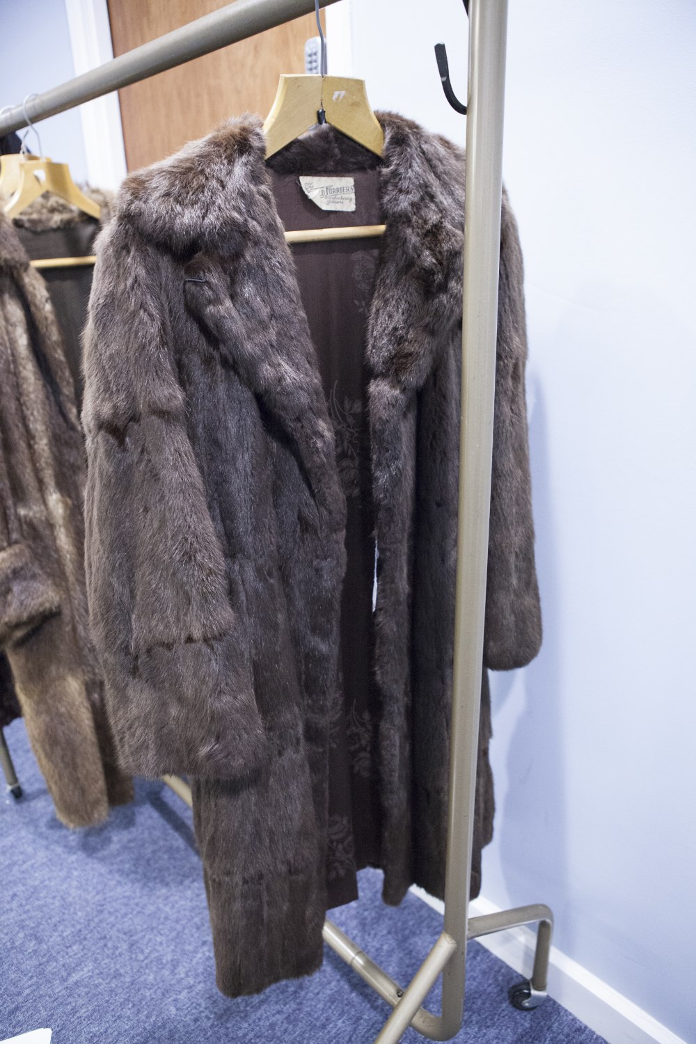 LADY'S BROWN MUSQUASH FULL LENGTH FUR COAT, WITH REVERED COLLAR, DOUBLE BREASTED HOOK FASTENING