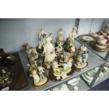 A SELECTION OF 21 LEONARDO RESIN COMPOSITION FIGURINES