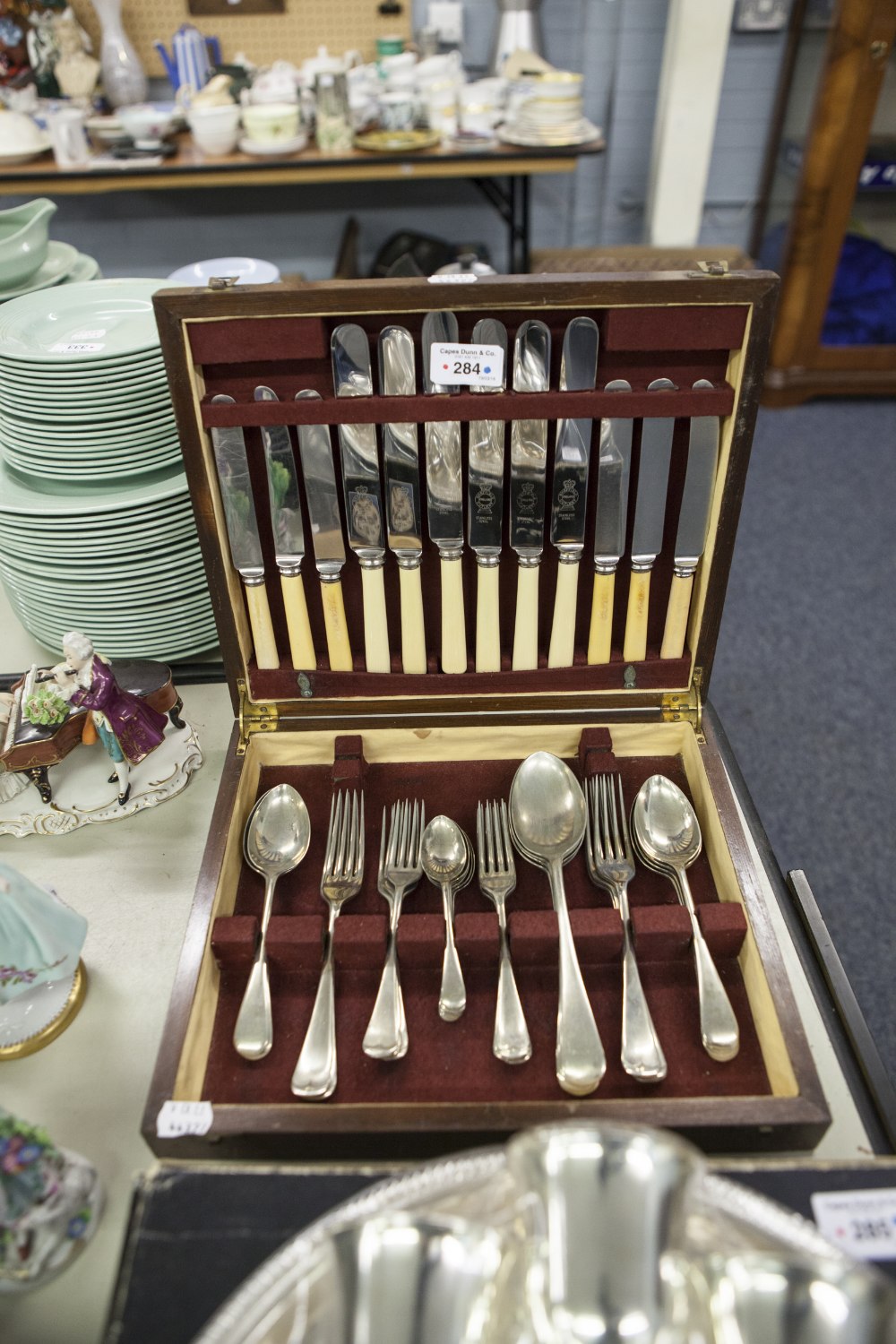 A CASED SET OF ELECTROPLATE CUTLERY FOR SIX PERSONS, SOME WITH BONE HANDLES, IN OAK FITTED BOX AND A