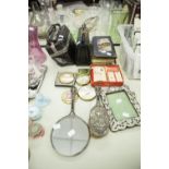 SILVER PLATE HAND MIRROR AND BRUSH, SILVER PLATE PHOTOGRAPH, COMPACTS AND TWO HANDBAGS ETC....