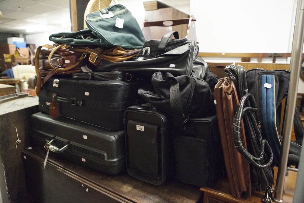 A QUANTITY OF SUITCASES AND LEATHER BAGS, BRIEFCASE ETC...