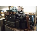 A QUANTITY OF SUITCASES AND LEATHER BAGS, BRIEFCASE ETC...