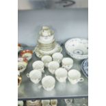 GROSVENOR CHINA 'OLD ENGLISH' CHAIN TEA WARES INCLUDING NINE TEA CUPS AND SAUCERS, TWO CAKE PLATES