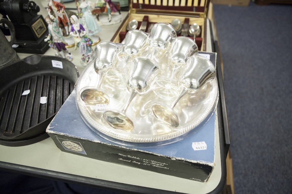 A BOXED SET OF ELECTROPLATE GOBLETS AND TRAY