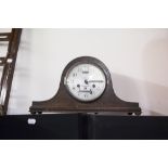 A TWENTIETH CENTURY OAK CASED NAPOLEONS HAT SHAPED MANTEL CLOCK, SILVERED DIAL AND BLACK NUMERALS