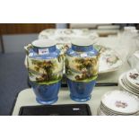 A PAIR OF NORITAKE SATSUMA VASES WITH HANDLES, GILT HIGHLIGHTS, PAINTED WITH LAKE SCENES (2)