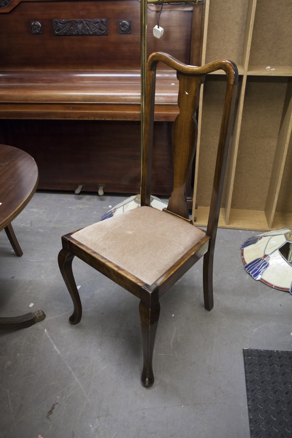 A PAIR OF MAHOGANY REGENCY STYLE CARVERS ARMCHAIRS ON SABRE SHAPED FRONT SUPPORTS AND A QUEEN ANNE