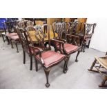 A SET OF SIX MAHOGANY CHIPPENDALE STYLE DINING CHAIRS WITH RED LEATHER SEATS (4 + 2)