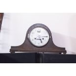 A TWENTIETH CENTURY OAK CASED NAPOLEONS HAT SHAPED MANTEL CLOCK, SILVERED DIAL AND BLACK NUMERALS