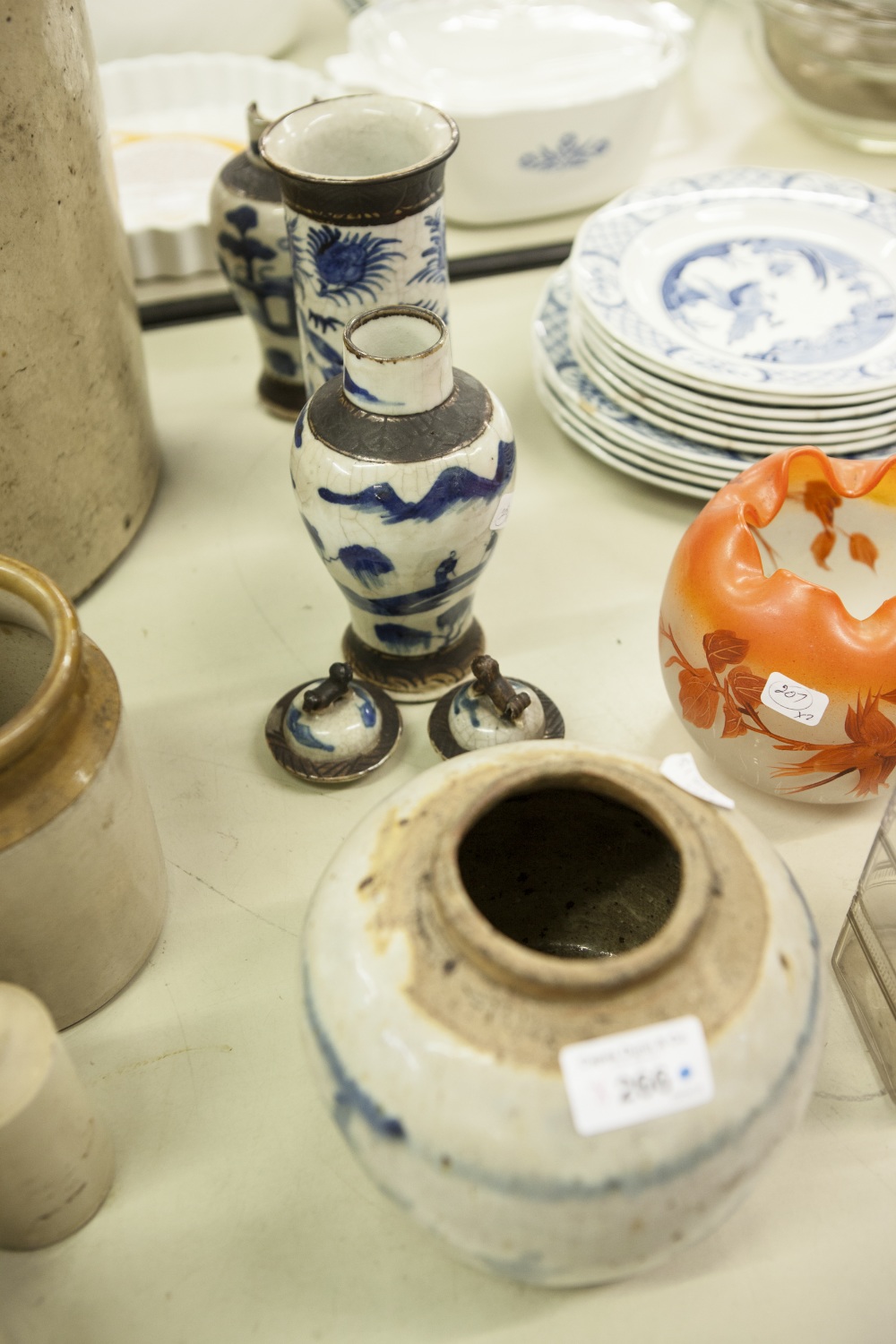 A PAIR OF CHINESE BLUE AND WHITE INVERTED BALUSTER SHAPE CRACKLE WARE VASES WITH COVERS AND AN