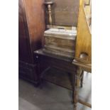 A JONES FAMILY C.S. OAK CASED SEWING MACHINE AND AN OAK DROP LEAF TROLLEY (2)