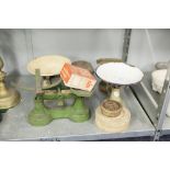 THREE KITCHEN SCALES, A STONE HOT WATER BOTTLE PLUS A NUMBER OF GLASS FLOWER RECEIVERS, ETC.