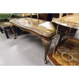 A FIGURED WALNUTWOOD LONG COFFEE TABLE, ON CARVED CABRIOLE LEGS, WITH PLATE GLASS TOP