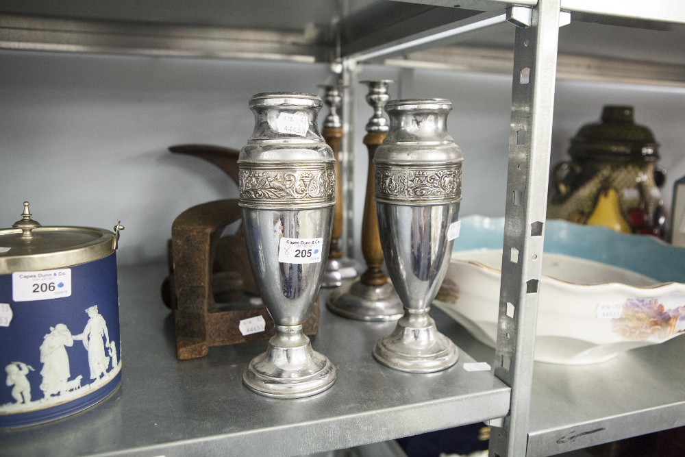 TWO IRON COBBLER'S LASTS, TWO BRIGHT METAL VASES, A PAIR OF WOOD AND METAL CANDLESTICKS