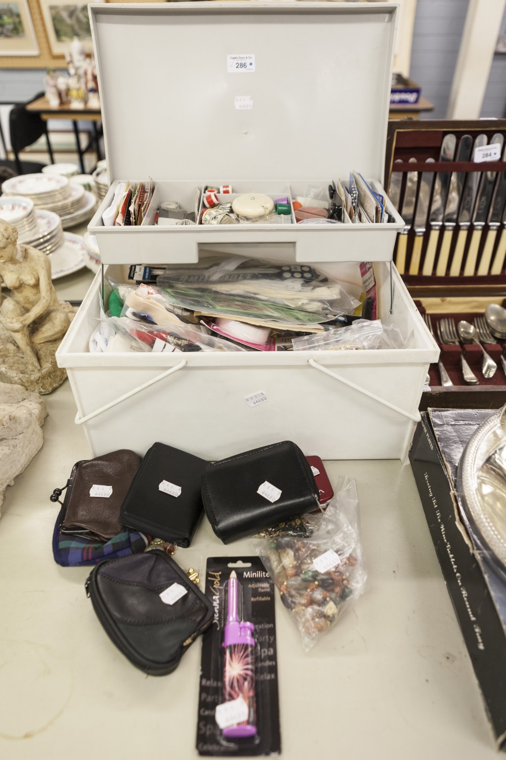 A MODERN SEWING BOX WITH CONTENTS, CONCERTINA TRAY WITH A SELECTION OF LADIES PURSES, A LIGHTER,