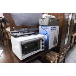 A TABLE TOP ELECTRIC OVEN WITH TWO PLATES, DELONGHI DEHUMIDIFIER, HP PRINTER AND A GUILLOTINE