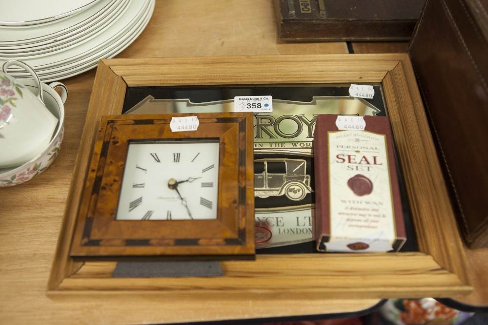 A ROLLS ROYCE WALL MIRROR, IN PINE FRAME; A DESK CLOCK WITH BIRDS EYE MAPLE FRAME AND A PERSONAL
