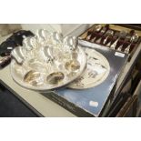 A BOXED SET OF ELECTROPLATE GOBLETS AND TRAY