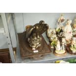 A GILT PLASTER MODEL OF AN HERALDIC EAGLE, AN AUSTRIAN LEAF CARVED AND PIERCE TWO HANDLED OVAL