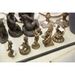 FIVE TWENTIETH CENTURY EASTERN CAST BRASS BUDDHIST DEITY FIGURES (5)