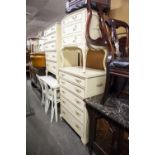 PAIR OF MID TWENTIETH CENTURY FRENCH STYLE CREAM FINISH AND GILT FIVE DRAWER CHESTS AND A VERY