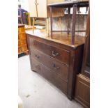 AN EARLY NINETEENTH CENTURY MAHOGANY CHEST OF THREE LONG DRAWERS