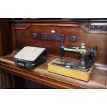 SINGER MANUAL PORTABLE SEWING MACHINE AND A LILLIPUT SMALL MANUAL TYPEWRITER IN CASE