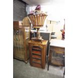 A MAHOGANY JARDINIERE/PLANT POT HOLDER AND AN INLAID MUSIC CABINET (LACKING TOP AND FEET) (2)