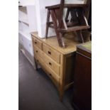 A LIGHT OAK TWENTIETH CENTURY DRESSING CHEST WITH CIRCULAR SWING MIRROR