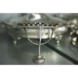 FOREIGN SILVER COLOURED METAL MENORAH, the removable narrow oblong top having a row of eight